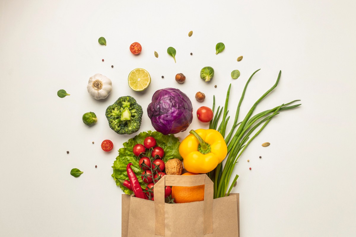 top-view-assortment-vegetables-paper-bag-1